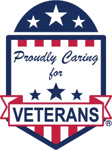 A SYNERGY HomeCare live-in caregiver providing steady, hands-on support to a senior at home
